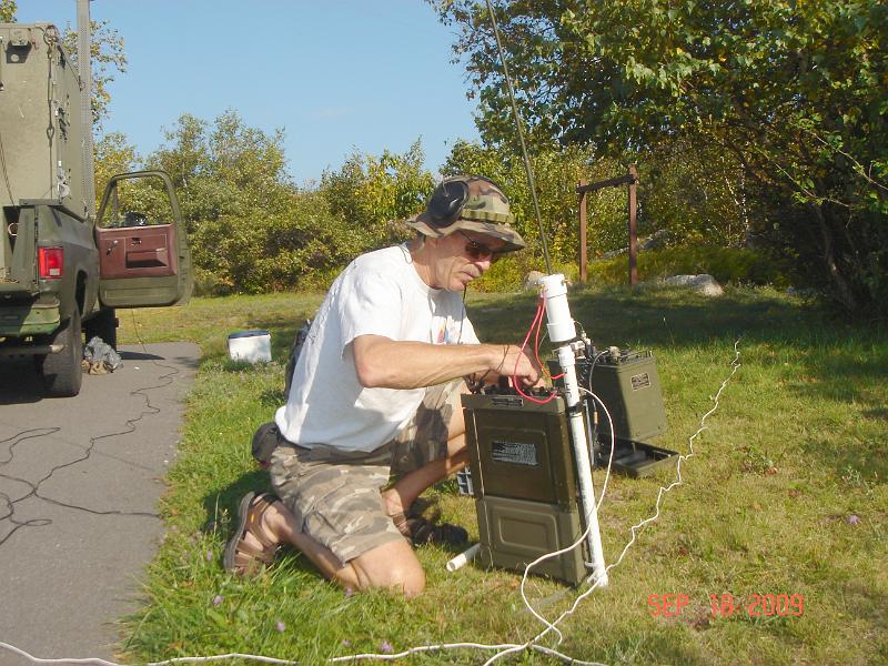 DSC04719.JPG - Tuning up the PRC-74    - Photo: Pat Lombardi