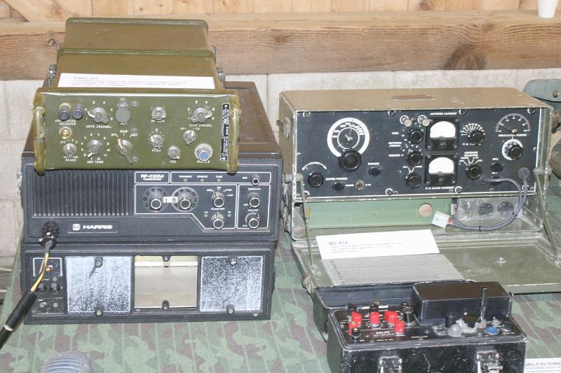 IMG_0988.JPG - Dale, KW1I's radios:  TRC-77 atop Harris RF-230M.  BC-474 and Delco 5300.